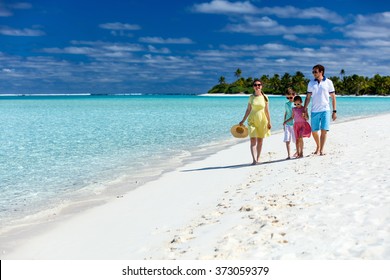 Happy Beautiful Family On A Tropical Beach Vacation At Exotic Island In South Pacific