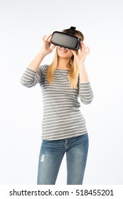 Happy Beautiful Girl Wearing Virtual Reality Goggles VR 360 On Isolated White 