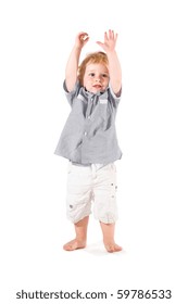 Happy Beautiful Little Kid Raising Arms To Celebrate Isolated On White Background