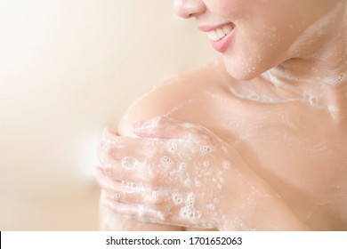 Happy  Beautiful Woman Is Taking A Shower 