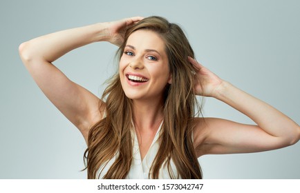 Happy Beautiful Woman Touching Her Long Hair. Isolated Female Portrait.