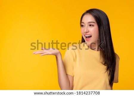 Similar – Image, Stock Photo Beautiful woman holding a DC CCS2 EV charging connector on a Hypercharger or Supercharger for recharge her car.