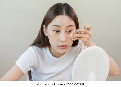 Happy Beauty, Beautiful Asian Young Woman, Girl Looking In To Mirror, Holding Cotton Pad, Applying Facial Wipe On Her Face, Removing Makeup Before Shower In Bathroom, Skin Care On White Background.