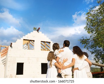 Happy and big family builds a new house for living