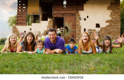 Happy Big Family In The Garden