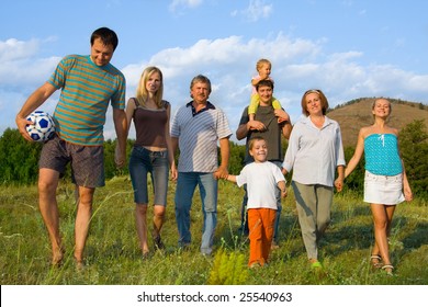 Happy Big Family Have A Rest In Park