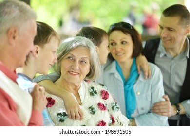 Happy Big Family In A Summer Park