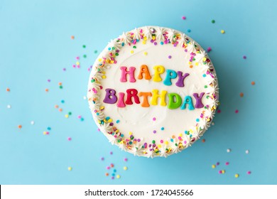 Happy birthday cake with rainbow lettering - Shutterstock ID 1724045566
