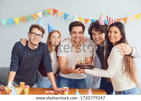 Similar – Man with piece of cake in a summer barbecue