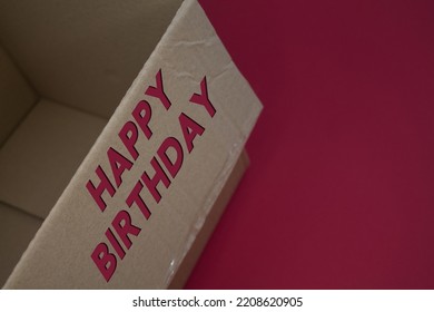Happy Birthday word with cardboard box. Brown folded card box. - Shutterstock ID 2208620905