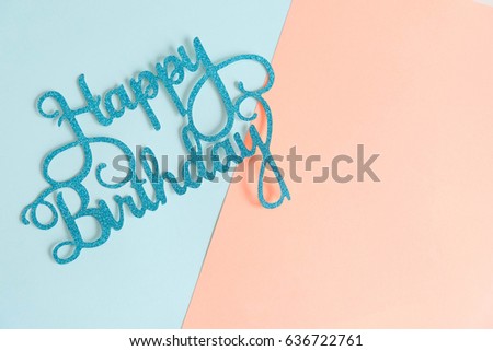 happy birthday written on a purple banner, flowery background