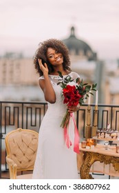 Happy Black Bride Corrects Her Hair And Smiling. Wedding Day