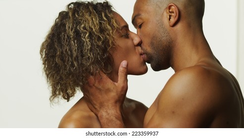 Happy black couple kissing