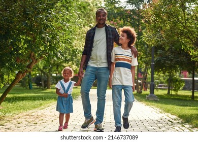 Happy Black Family Walking On Pavement Stock Photo 2146737089 ...