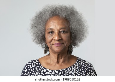 Happy black senior woman in a studio shoot - Powered by Shutterstock