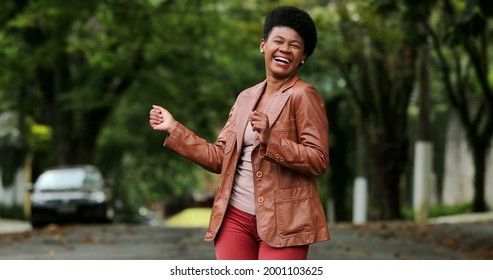 Happy Black Woman Dancing Outside. One Groovy African Person Dance