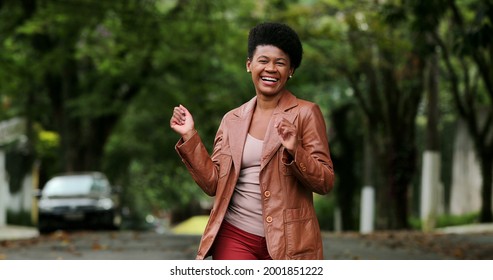 Happy Black Woman Dancing Outside. One Groovy African Person Dance