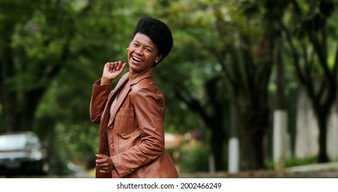 Happy Black Woman Dancing Outside. One Groovy African Person Dance