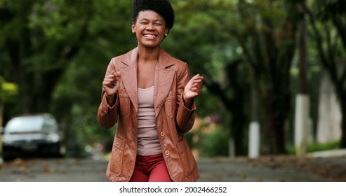 Happy Black Woman Dancing Outside. One Groovy African Person Dance