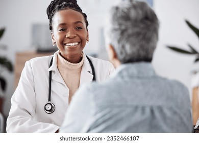 Happy, black woman or doctor consulting a patient in meeting in hospital for healthcare feedback or support. Smile, medical or nurse with a mature person talking or speaking of test results or advice - Shutterstock ID 2352466107