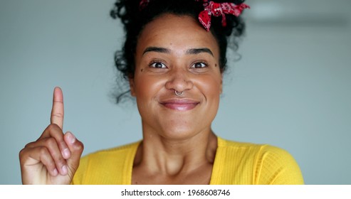 Happy Black Woman Having An Idea Breakthrough. Girl Eureka Moment 