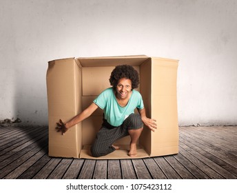 Happy Black Woman Inside A Box On A Room