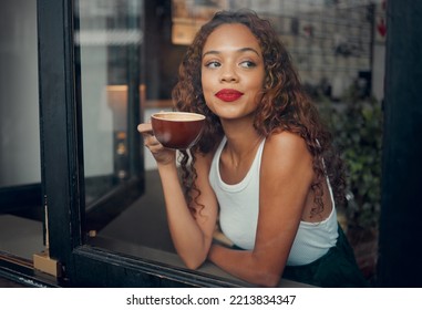 Happy black woman, relax in cafe with smile at window and drinking coffee or tea thinking about future. Young African American girl in a coffee shop, latte drink and creative idea inspiration - Powered by Shutterstock