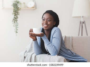 Happy Black Woman Relaxing On Couch Stock Photo 1582239499 | Shutterstock