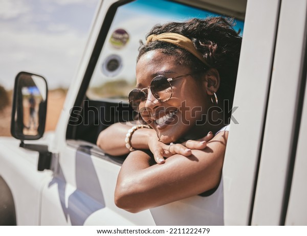 Happy black woman, travel and summer on road trip\
with smile for vacation or break in the outdoors. African American\
female smiling in happiness for holiday getaway, adventure and\
traveling in Mexico
