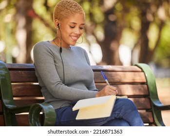 Happy, Black Woman And Writer Outdoor With Music To Relax, Enjoy Sunny Day And Make Notes For Studies. Young Female, Lady Student With Notebook And Podcast, Writing In Diary Or Journal Outside.