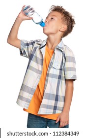 Happy Boy Drinks Water From A Bottle Isolated On White Background