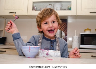 A Happy Boy Eating Yogurt