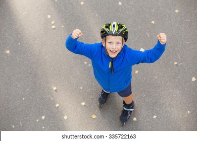 Happy boy excited about roller skating