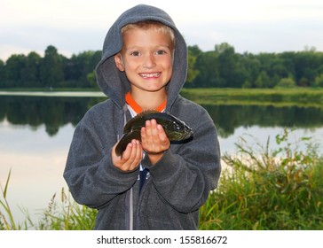 Happy Boy With His Catch, A Bluegill Sunfish