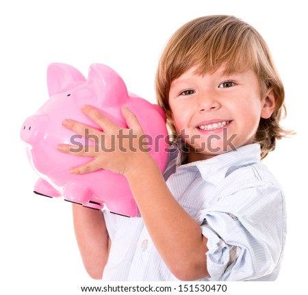 Happy boy holding a piggybank - isolated over a white background 