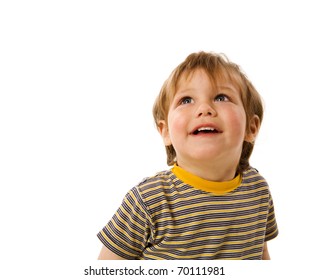 Happy Boy looking up laughing isolated on white