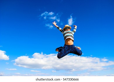 Happy Boy Motion Jumping Happily Against Stock Photo 547330666 ...