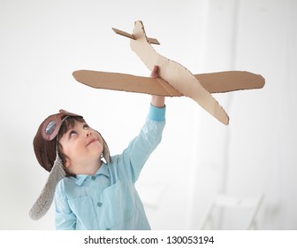 happy boy play in airplane  indoors