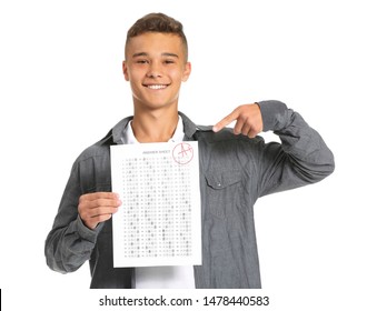 Happy Boy With Results Of School Test On White Background