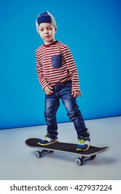 Happy Boy Riding Skateboard Stock Photo (Edit Now) 427937185
