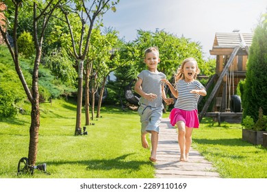 Happy boy runs along the path in nature, copy-paste - Powered by Shutterstock