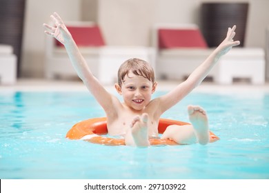 Happy Boy Swiming In Pool