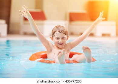 Happy Boy Swiming In Pool