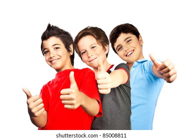 Happy boys, teenagers smiling, thumbs up, portrait of best friends isolated on white background, cute kids having fun - Powered by Shutterstock