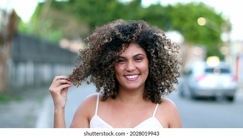 Happy Brazilian Hispanic Latina Woman Smiling To Camera Outside In Street.