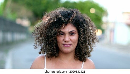 Happy Brazilian Hispanic Latina Woman Smiling To Camera Outside In Street.