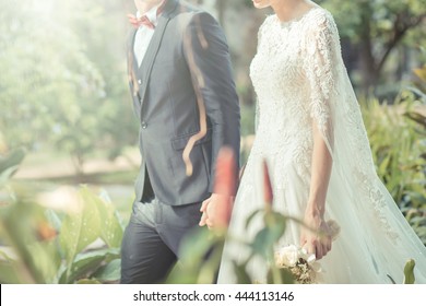 Happy Bride And Groom On Their Wedding. Vintage Tone Color