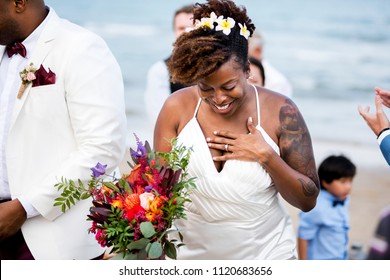 Happy bride and groom in a wedding ceremony at a tropical island