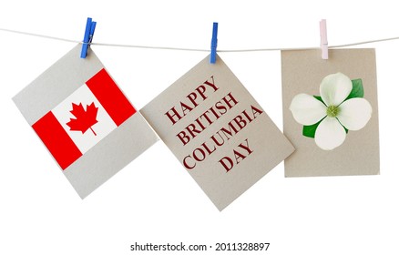 Happy British Columbia Day. Holiday greeting cards with Pacific dogwood flower - Floral emblem of B.C. and Canadian national flag. Festive cards hanging on the rope isolated on white