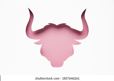 Happy bull year. Christmas tendy card 2021.  silhouette of a pink bull . Chinese Zodiac. Chinese new year 2021. paper cut style. paper cut bull.  happy new year